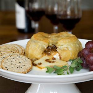 Baked Brie with Praline Sauce - Langenstein's Catering